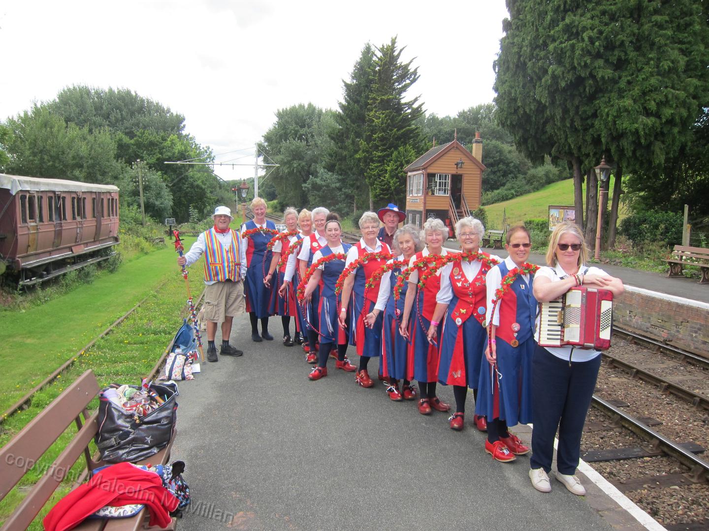 team lined up on the station platform